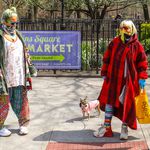 Two women in the East Village wearing colorful face coverings